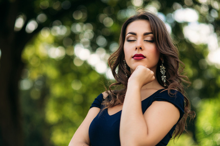 Portrait of beautiful girl with prifessional makeup and hair styleの写真素材