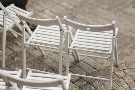 White chair on wedding ceremony. summer wedding decoration outsideの写真素材