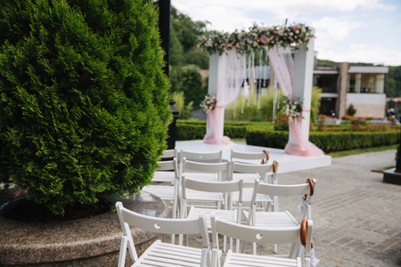White chair with white umbrella. Wedding ceremonyの写真素材