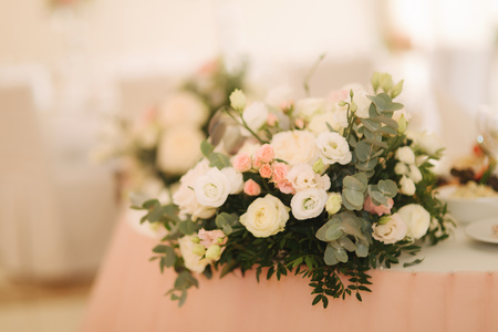Wedding bouquet in restaurant on the tableの写真素材
