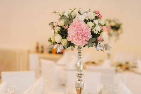 Wedding bouquet in restaurant on the tableの写真素材