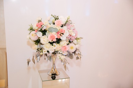 Wedding bouquet in restaurant on the tableの写真素材