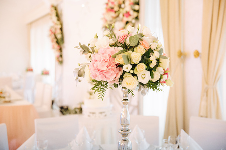 Wedding bouquet in restaurant on the tableの写真素材