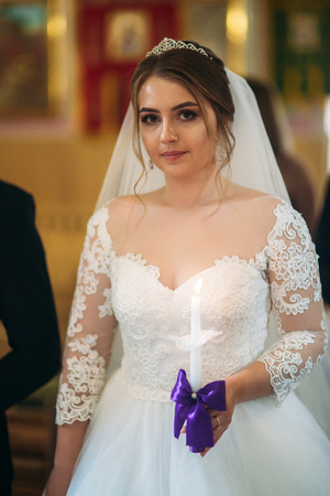 The bride give a vow of love in the churchの写真素材