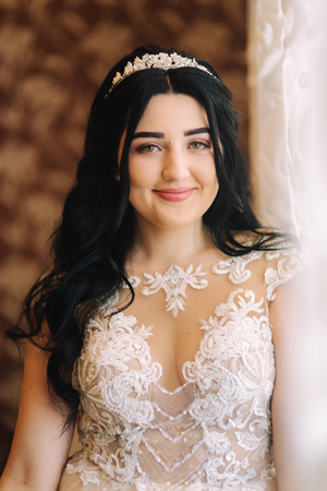 Beautiful bride in wedding dress. brunette woman posing to photographerの写真素材