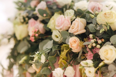 Floral decoration on the wedding table in restaurantの写真素材