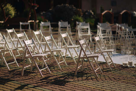White chair on wedding ceremony. Outside. Summer timeの写真素材