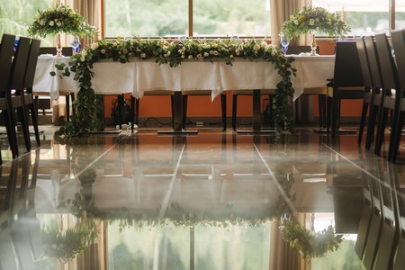 Table appointment in restaurant. Wedding decoration in blue styleの写真素材