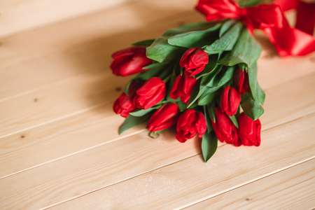 Beautiful Rustic background with Red Tulips. Colorful Card for Mothers Day, Birthday, International Womens Day March 8の写真素材