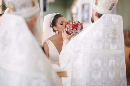 Groom and bride in the church. Newlyweds on their wedding