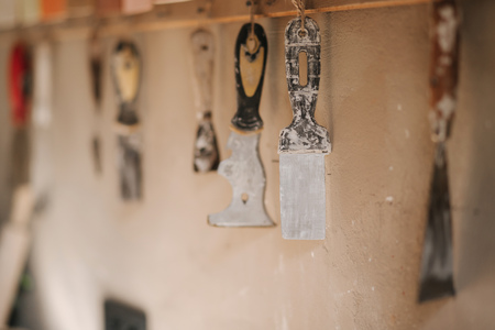 Potters tools in his workshop. Spatula and brushesの写真素材