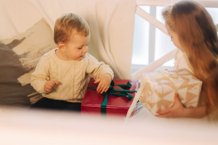 Brother and sister spent time together on holiday. Christmas time