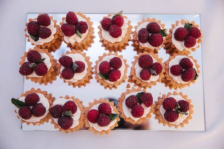 Sweet desserts on the table. Different desserts on candy barの写真素材