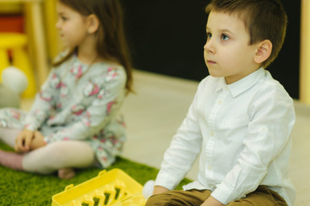 Children playing in nursery. Kindergarden. Boy and girls