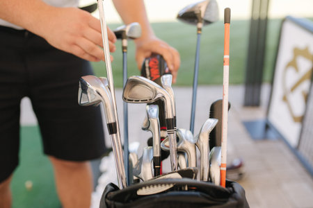 Close up playing golf on golf course. Concept of training play golf. First time
