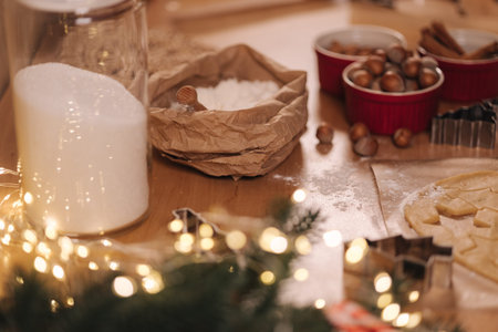 Preparing for baking at happy Christmas evening. Make some sweets at home