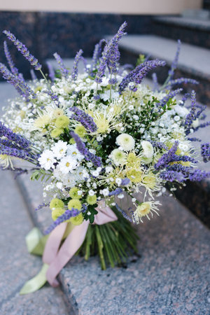 Beautiful bouquet with different flowers and lavender