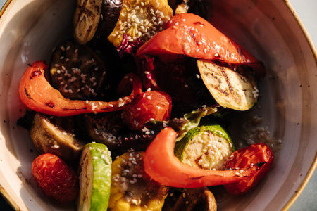 Top view of portion of delicious and healthy grilled vegetables on a plateの写真素材