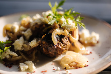 Macro photo of delicious baked potatoes in a uniform with onions and lardの写真素材