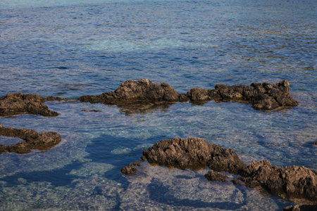 Mallorca, Spain, Cala Mesquida. Rocky coast. Blue sea water in summer, Cala Agulla. High quality...
