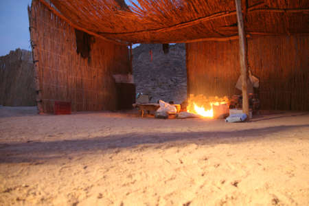 The house bedouin is the centre and a roof which rescues from the scorching sunの写真素材