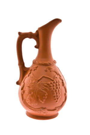 Jug from red ceramics on a white backgroundの写真素材