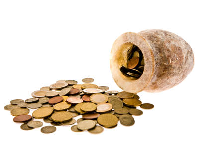 Coin box full of metal coins of a different origin and face valueの写真素材