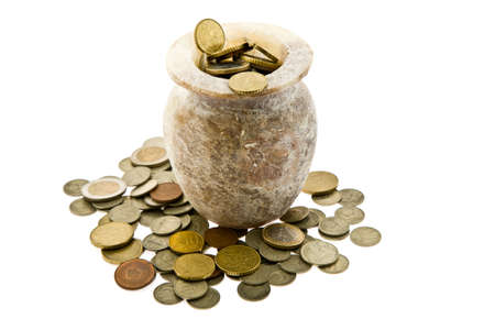 Coin box full of metal coins of a different origin and face valueの写真素材