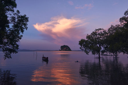Koh Phee, ghost-faced island, is located near Ko Lanta Noi, in Krabi, Thailand.