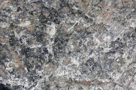 Closeup on a Natural Green and Orange Rock Texture