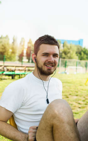 Handsome young man is exercising outside.の写真素材
