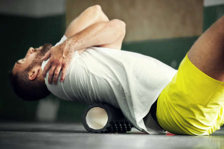 Young fit man is prepairing for training.の写真素材