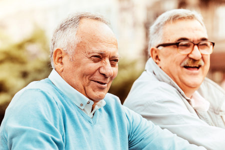 Senior friends enjoying city early in the morning.