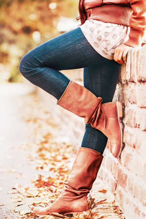 Woman in the park on beautiful autumn day.の写真素材
