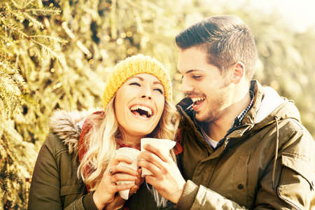 Holidays, winter, love concept. Happy Couple enjoying holidays.の写真素材