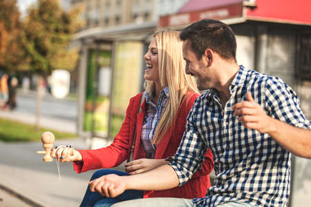 Young happy couple is enjoying outside.の写真素材