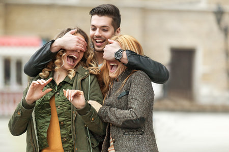 Group of young people having fun in the city.