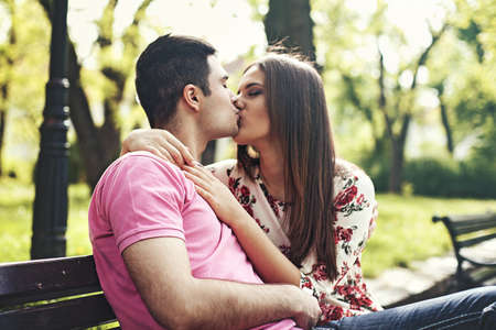Young couple enjoying spring in the park.の写真素材