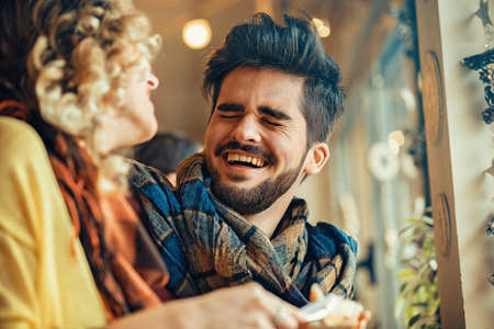 Young couple enjoying restaurant.の写真素材