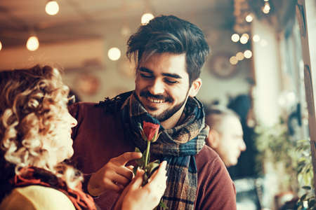 Young couple enjoying restaurant.の写真素材
