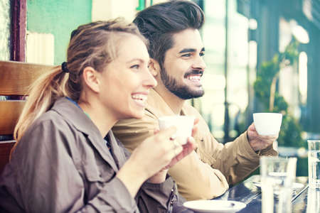 Young couple is enjoying coffee in the morning.の写真素材