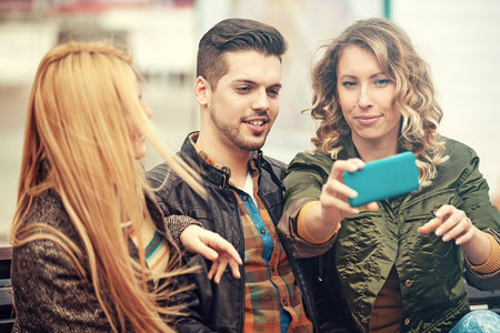 Group of young people having fun in the city.