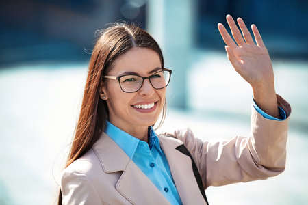 Portrait of beautiful smiling businesswoman wearing glasses.の写真素材