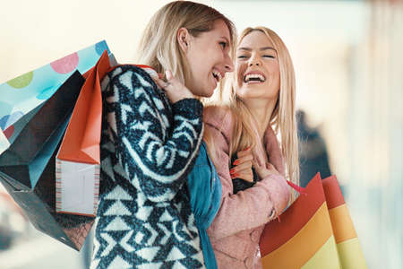 Young and attractive young woman enjoying shopping.の写真素材