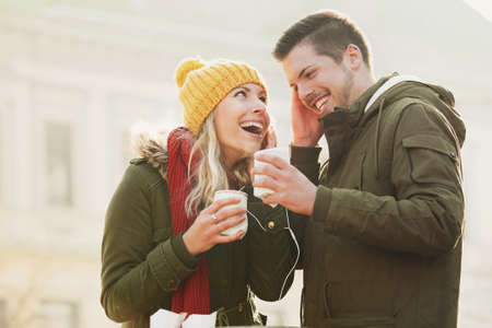 Young couple in love enjoying autumn day together.の写真素材