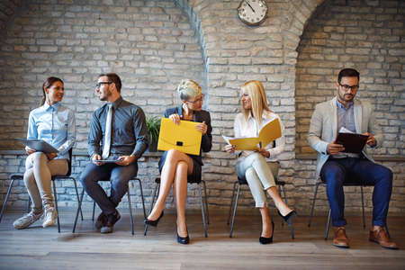 Group of young people are waiting for job interview.の写真素材