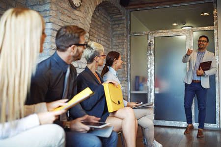 Group of young people are waiting for job interview.の写真素材