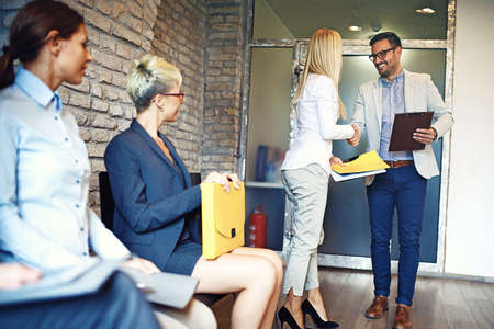 Group of young people are waiting for job interview.の写真素材