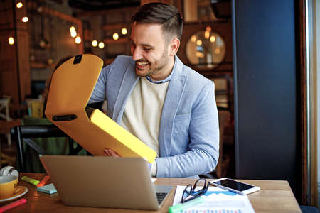 Businessman doing his freelance job in cafe.の写真素材