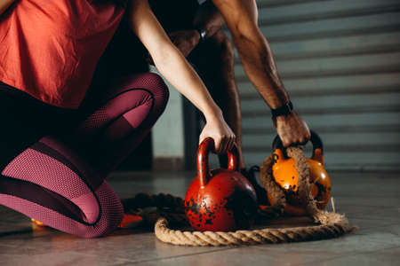 Couple is ready for fitness training in the garage.の写真素材